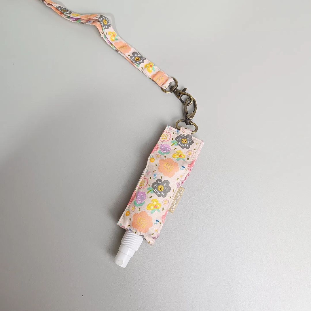 TALI LANYARD & HAND SANITIZER HOLDER_C3285_AYANA IVORY